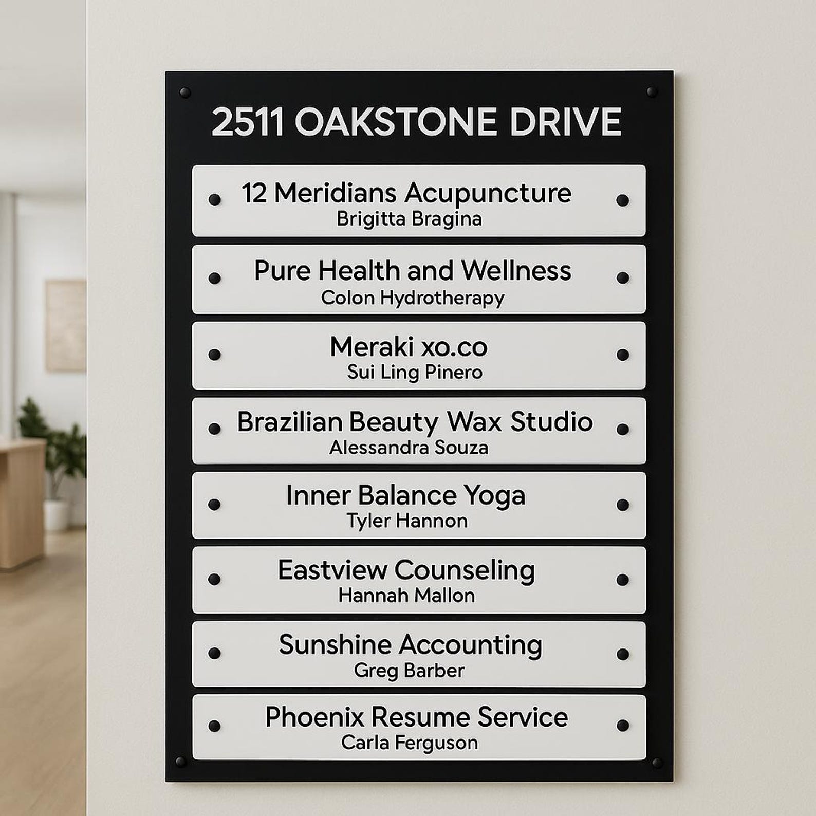 Monument sign for 2511 Oakstone Drive — two layer routed ColorCore dimensional lettering.